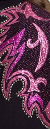 close-up of jacket trimmed with pink and magenta metallic leather