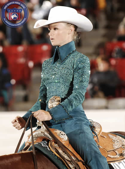 Erin wears forest green pigsuede chaps and a shirt trimmed in matching pigsuede at the Ohio Quarter Horse Congress