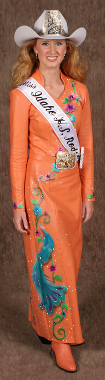 Whitney Summers wears a light coral lambskin dress