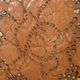 Cognac laser lace leather, rose motif