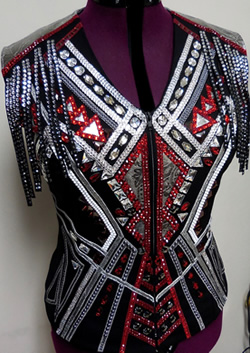 Vest trimmed with metallic leather diamonds and yolk