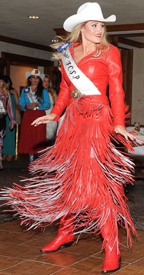 Lisa Lagaschaar wears a fire red Lambskin Dress