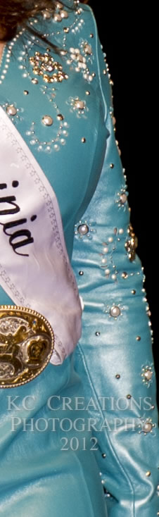 Close-up of Lindsay Harper's jade lambskin dress