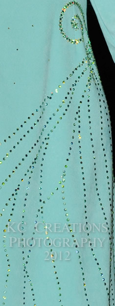 Close-up of Michelle Morris' azure lambskin dress
