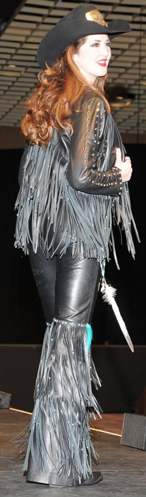 Morgan Blackhurst, miss Rodeo Tennessee wearing black lambskin jacket and fringed chaps