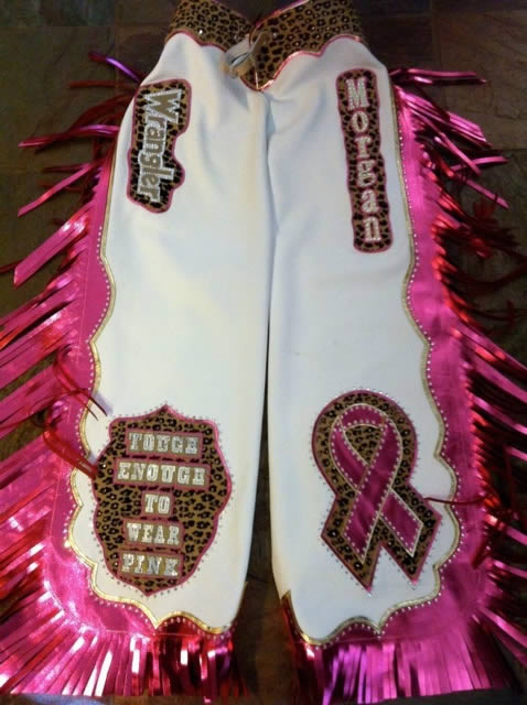 white cowhide chaps trimmed with magenta metallic leather